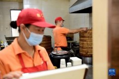 夫妻餐馆里的暖心“暗号”